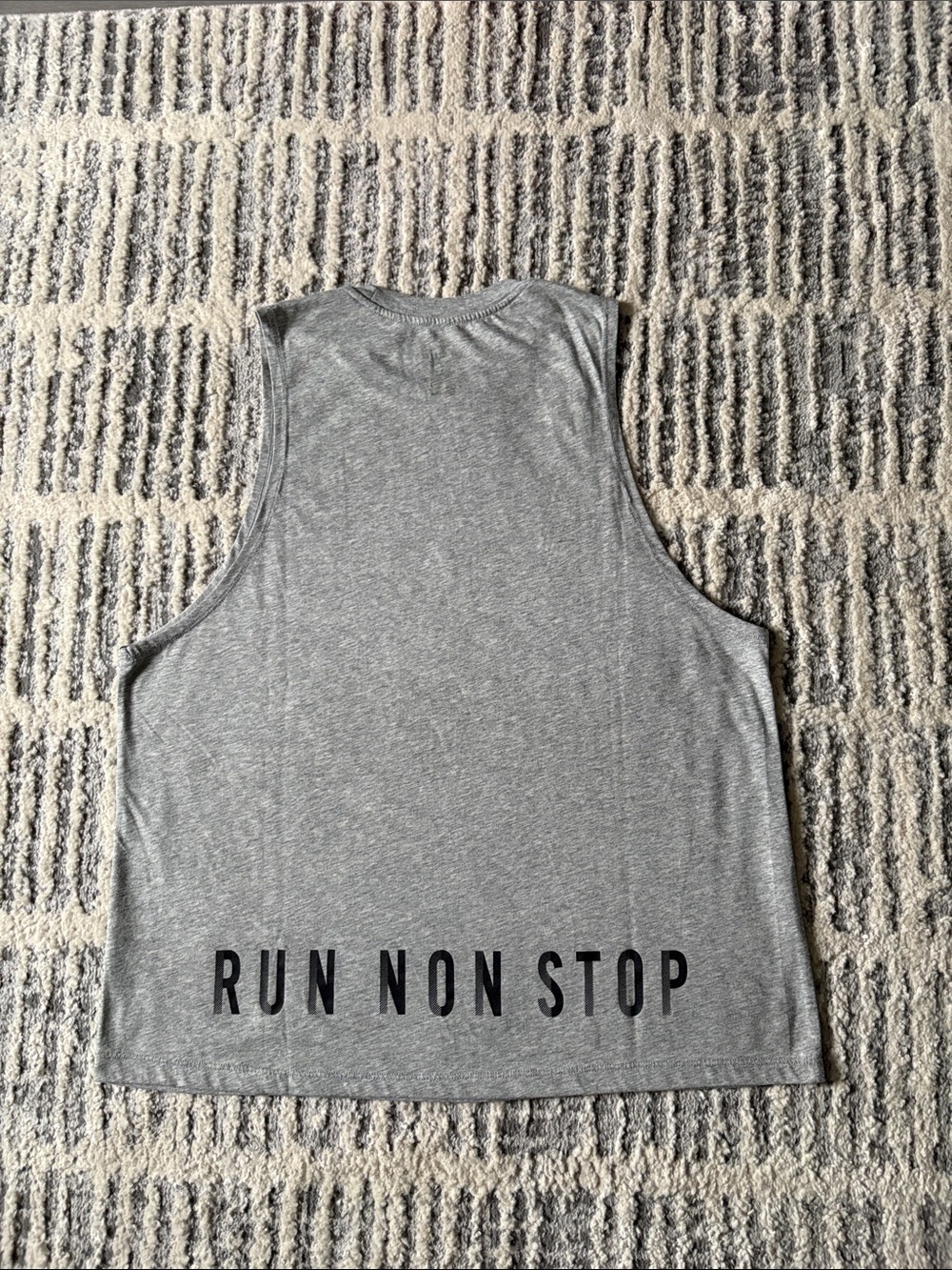 Nike Women’s Gray Athletic Tank Top with 'RUN NON STOP' Text